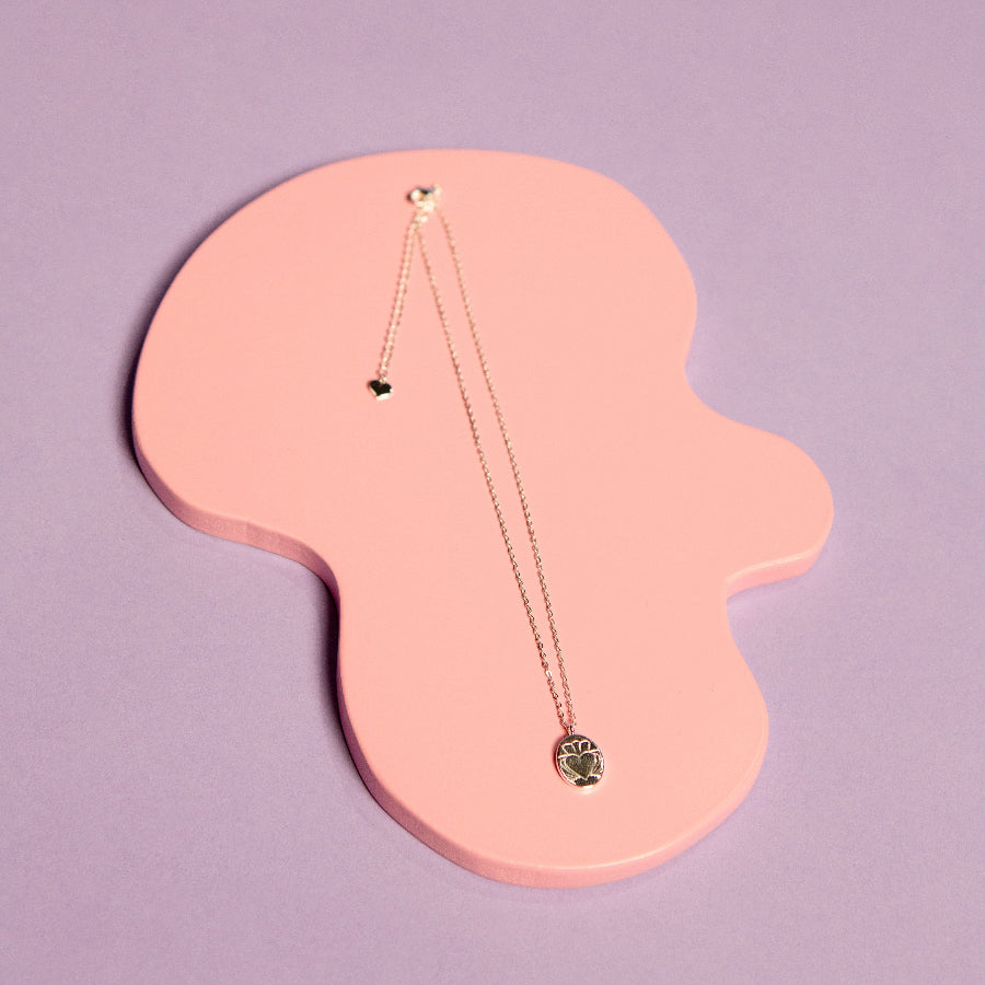 Model Wearing Heart Strong Coin Claddagh Gold Necklace