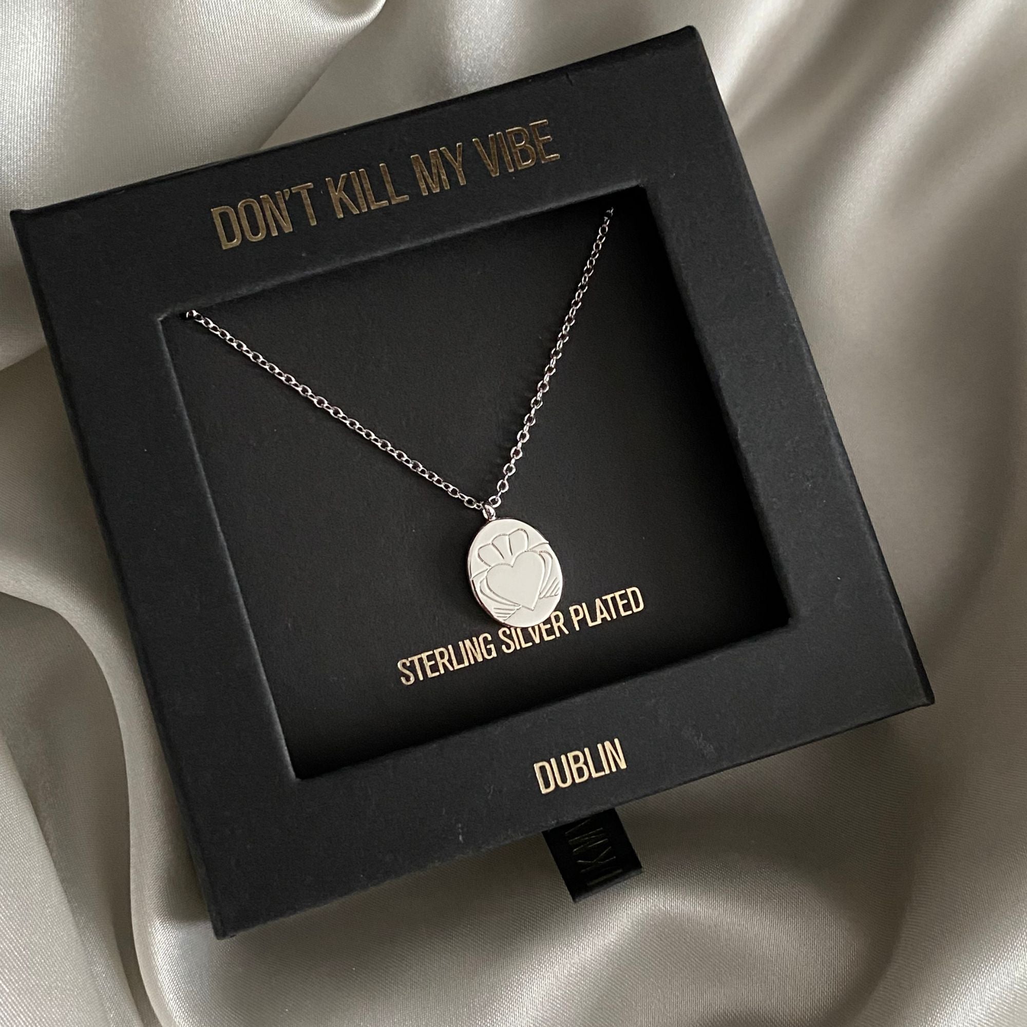 Silver Heart Strong Coin Claddagh Necklace in a Gift Box